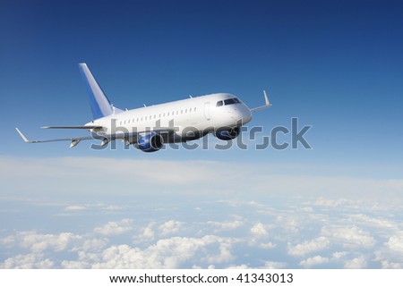 Airplane in the sky with clouds