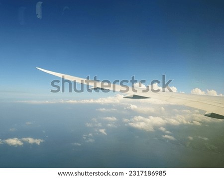 Similar – Foto Bild Wolkenspiel Flugzeug