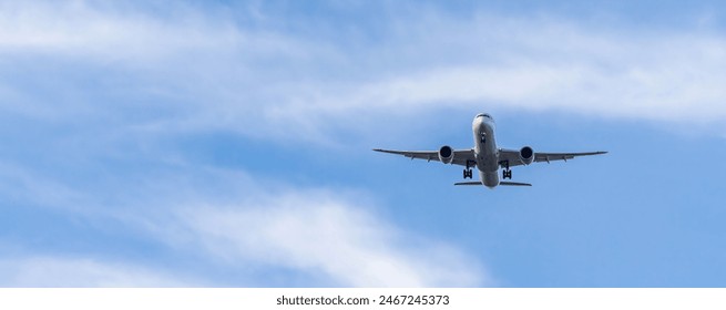 Airplane and sky, the plane is landing. Airplane take off on the blue sky, Aircraft flying on sky background. Passenger plane ready for landing. Low angle view of Airplane flying under blue sky. - Powered by Shutterstock