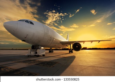Airplane at sunset    back lit