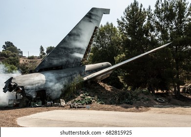 An Airplane Tail In A Plane Crash Site