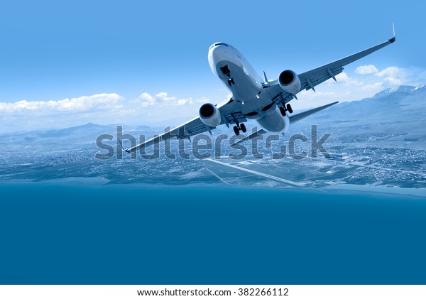 Airplane\
taking off from airport - Passenger airplane is flying over amazing\
mountains and sea  - Travel by air\
transport