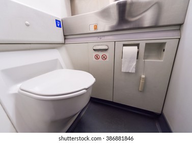 airplane toilet - Shutterstock ID 386881846