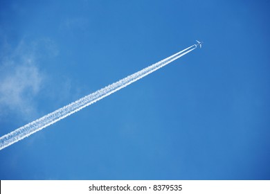 An airplane trail across the sky