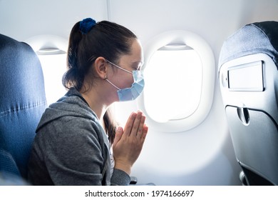 Airplane Travel Phobia. Scared Woman In Face Mask