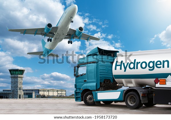 Airplane and truck with hydrogen\
tank trailer on the background of airport. Clean mobility\
concept
