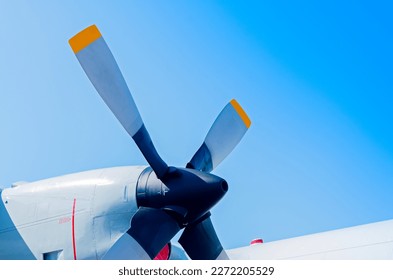 Airplane turboprop engine with propeller on blue sky background, Beautiful color view of the plane.