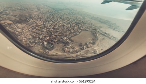 Airplane window view with a cloudy sky scenery background in vintage style.