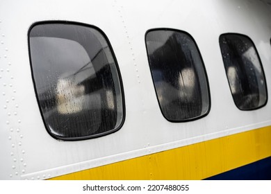 Airplane Windows From The Outside, At The Airport. 