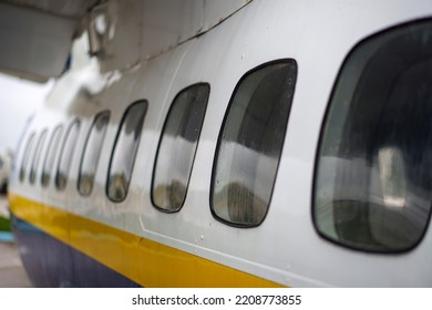 Airplane Windows From The Outside, At The Airport. 