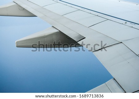 The airplane wing view in flight