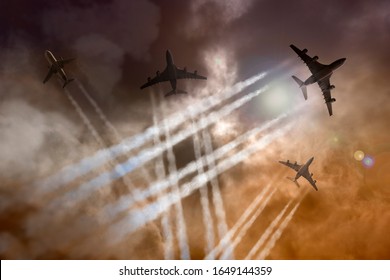 Airplanes fly against a dramatic sky, leaving contrails