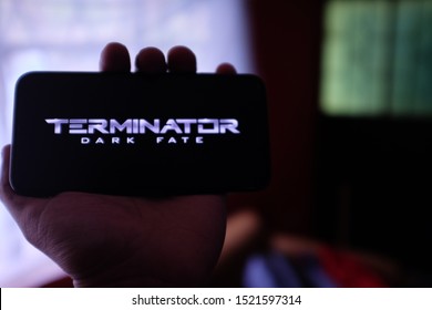 AirPods 2, Computer Keyboard And Iphone 11 Pro With The Logo The Dark Fate Terminator Movie That Is A New Movie About To Be Released. United States, New York, Thursday, October 3, 2019.