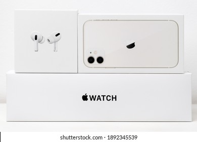 Airpods pro, iPhone 11, Apple watch boxes isolated on the white background, December 2020, San Francisco, USA