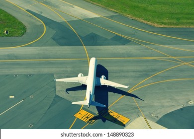 Airport - Airplane is taxiing for take off.