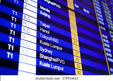  Airport arrival board in airport terminal. Travel concept.