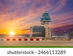 Airport control tower picturesque sky bright saturated clouds gradient background during sunset