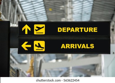 Airport Departure & Arrival information board sign in terminal at airport. - Shutterstock ID 563622454