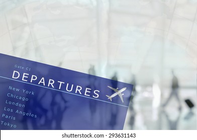 An airport departure board superimposed over an blurred airport scene with travellers and world map. The people are unrecognizable,  - Shutterstock ID 293631143
