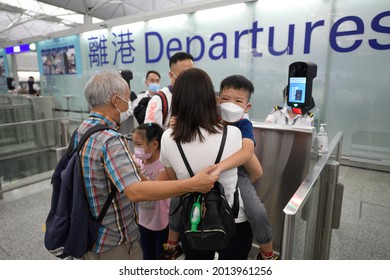 Airport Departures Terminal,HongKong-18July2021:last Day Of LOTR Leave Outside The Rules,people With Mask Feeling Sad,embrace, Hug To Friend Who Use BNO Identity Migrant To United Kingdom 