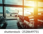 Airport gate waiting area and jumbo jet sunset view, travel concept