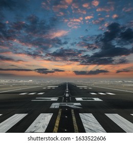 Airport Runway With Beautiful Cloudy Sky