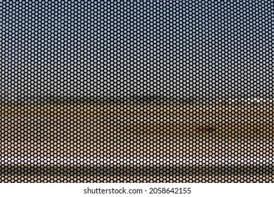 Airport Runway Through A Metal Screen With Small Holes To See Thru