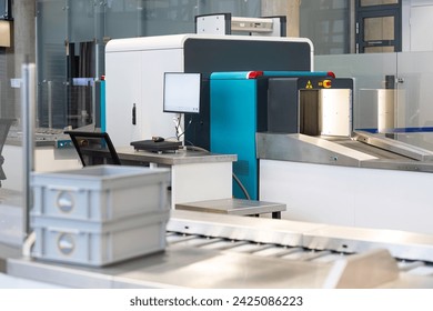 Airport security baggage scanner. High quality photo - Powered by Shutterstock