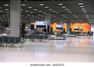 Airport terminal with baggage carousels for travelers - Shutterstock ID 36253171