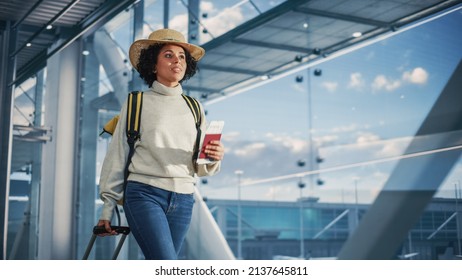 Airport Terminal: Black Woman Holds Ticket, in a Hurry is Late and Runs Through Airline Hub to the Gates and to Her Airplane. African American Female Running for Flight to Vacation Destination - Shutterstock ID 2137645811