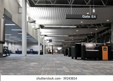 Airport Terminal Interior With No People Showing The Various Gates Information