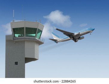 Airport tower with jet taking off in the background