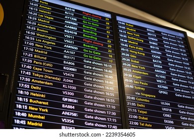 Airport travel information. 
Departures display board at airport terminal showing international flights to popular cities.