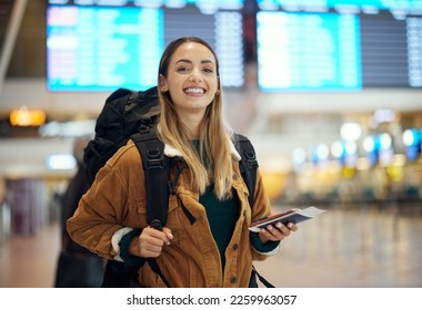 Airport, travel and portrait of woman with passport, flight ticket or information of immigration, journey and backpack. Young person, identity document and international registration. faq or about us - Shutterstock ID 2259963057