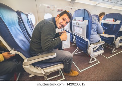 Airsickness In The Airplane, Man Passenger Afraid And Feeling Bad During The Flight In Plane