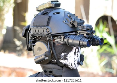 Airsoft Player With Night Vision Googles