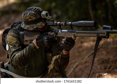 Airsoft Sniper in the woods 