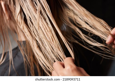 Airtouch Hair stylist makes bouffant using comb on thin strands. Shatush technique for hair lightening. - Shutterstock ID 2189093711