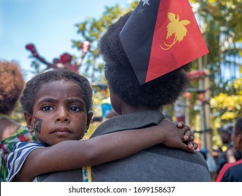 AITAPE, PAPUA NEW GUINEA - 17/09/2019: INDEPENDENCE DAY OF PNG, colorful clothes, painted faces, big ceremony, local people wearing traditional clothes, flowers, local dances