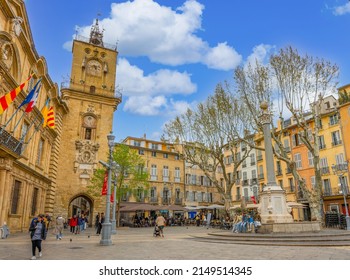 Aix En Provence, France - April 7 2022 - Place De L'Hôtel De Ville (Cityhall Square) With Toutist Drinking At Terraces