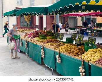 Aix-en-Provence, France - August 2021 : Vegetables Stall On The Traditional Aix En Provence Food Market On The Place Des Precheurs Square