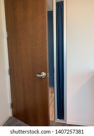 Ajar Door In Office Building.