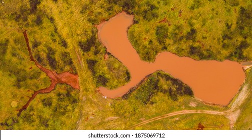 Ajka, Hungary - Aerial View Of The Famous Red Mud Disaster Site, Abstract Lines, Surreal Landscape, Red Mud Puddle.