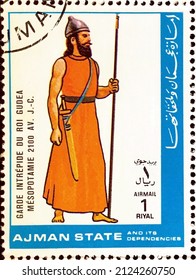 Ajman, circa 1972: Postage stamp from the Military Uniforms series showing Mesopotamia 2100 BC.