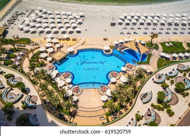 Ajman. Summer 2016. The Arabian Gulf with the line of the beach Fairmont Ajman Hotel. Top view of the hotel pool. 