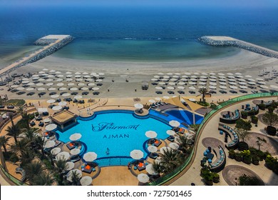 AJMAN, UNITED ARAB EMIRATES - JUNE 28, 2016: Lovely pool and beach in Fairmont Ajman five star hotel. Fairmont Hotel: 252 rooms and suites complete with ample space and stunning views of Arabian Gulf.