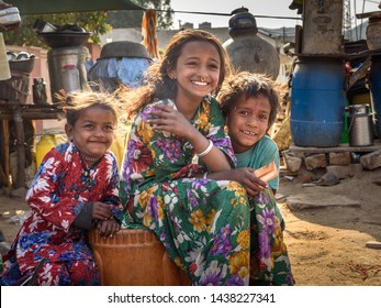 Ajmer, India - February 07, 2019: Indian children on the street. Poor people come with family to the city from the village for work. And they living in the street in tent home. Rajasthan