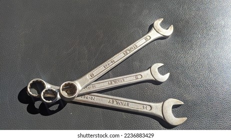 ajmer India-12 December 2022:Wrench on a Black background.Isolated wrench on black background.

 - Shutterstock ID 2236883429