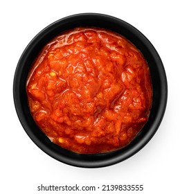 Ajvar in a black ceramic bowl isolated on white. Top view. - Powered by Shutterstock