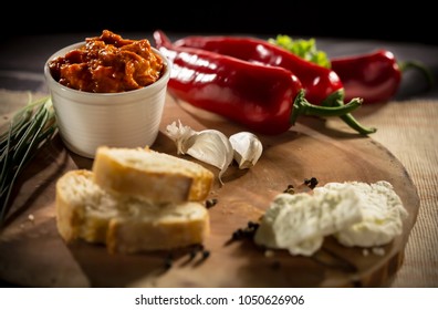 Ajvar Served With Bread And Cheese